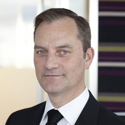 Headshot of Andrew Schuster